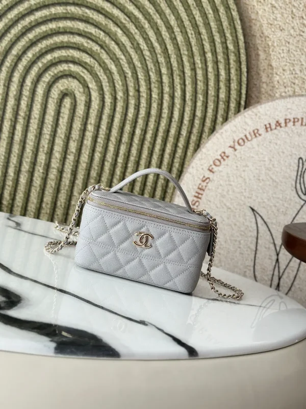 Chanel Quilted Crossbody Bag with Chain Strap and Top Handle image 1