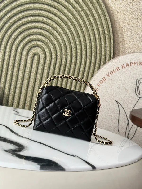 Chanel Quilted Hobo Bag with Woven Handle and Detachable Metal Chain image 1