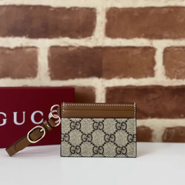 Gucci Monogram Card Holder with Wrist Strap image 1