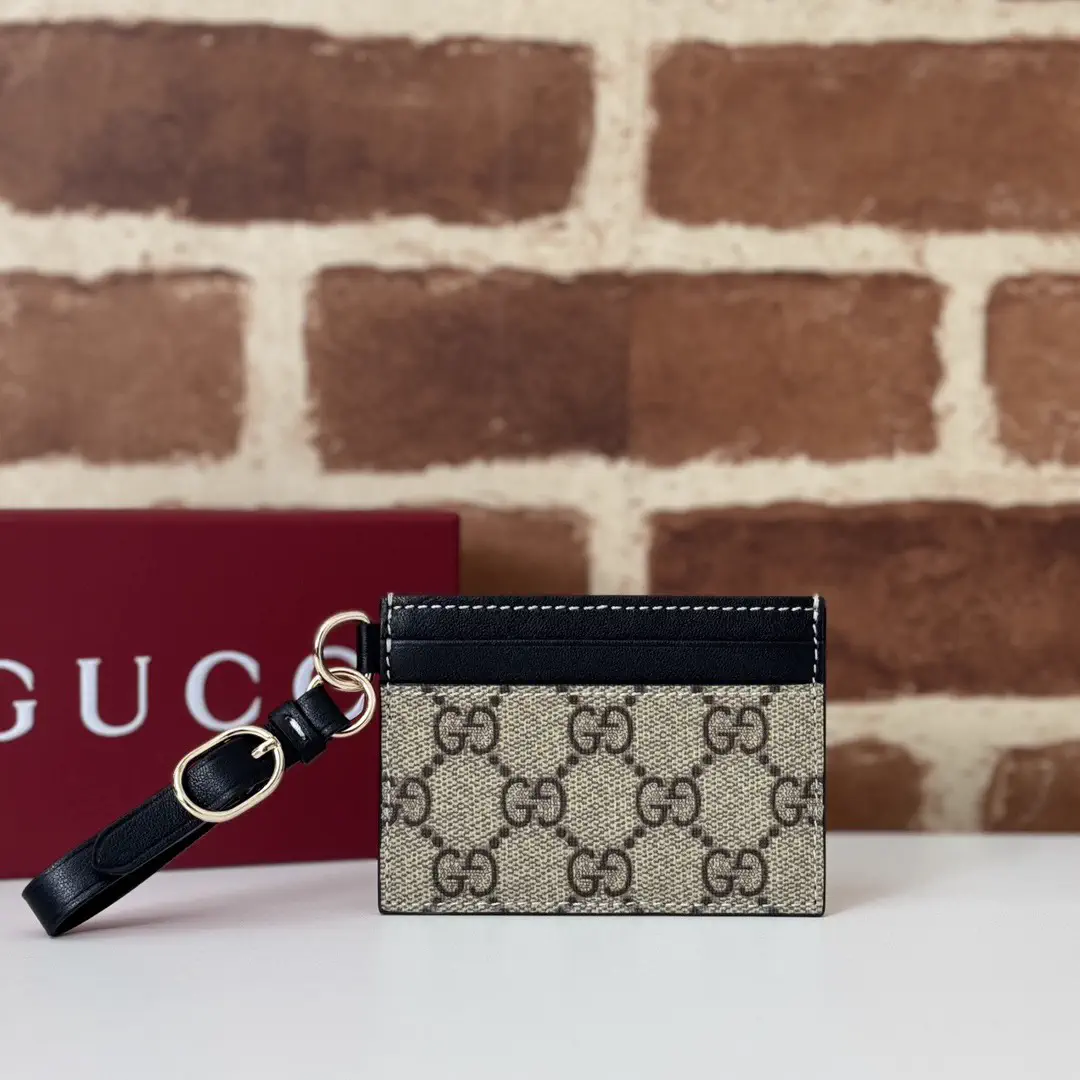 Gucci Monogram Card Holder with Wrist Strap image 1