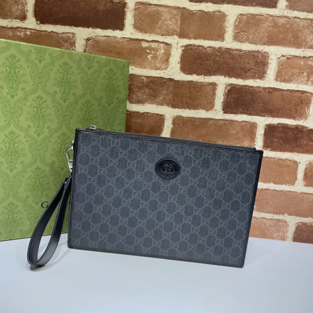 Gucci Monogram Clutch image 1