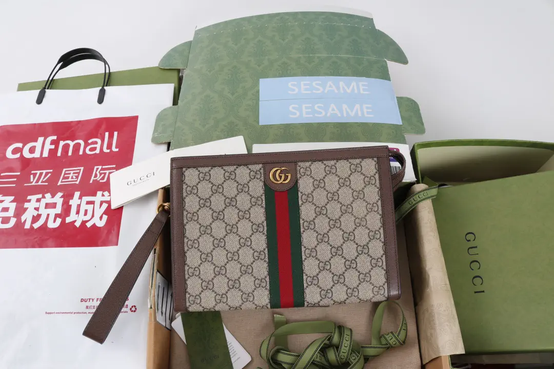 Gucci Ophidia GG Monogram Clutch image 1