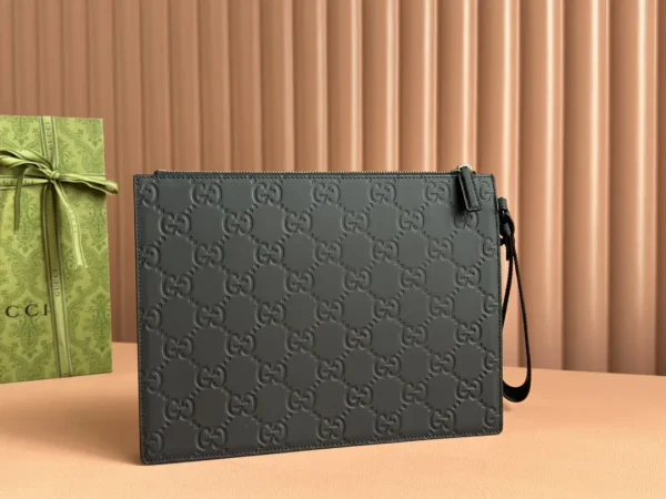 Gucci Black GG Embossed Clutch image 1