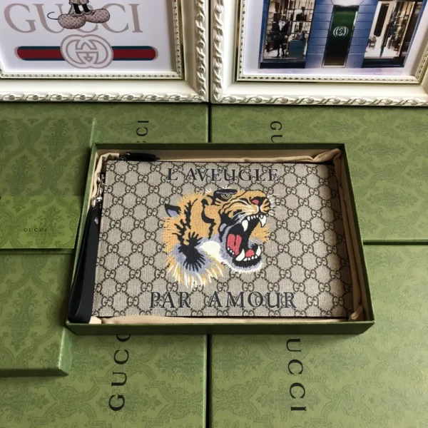 Gucci Tiger Print Monogram Clutch image 1