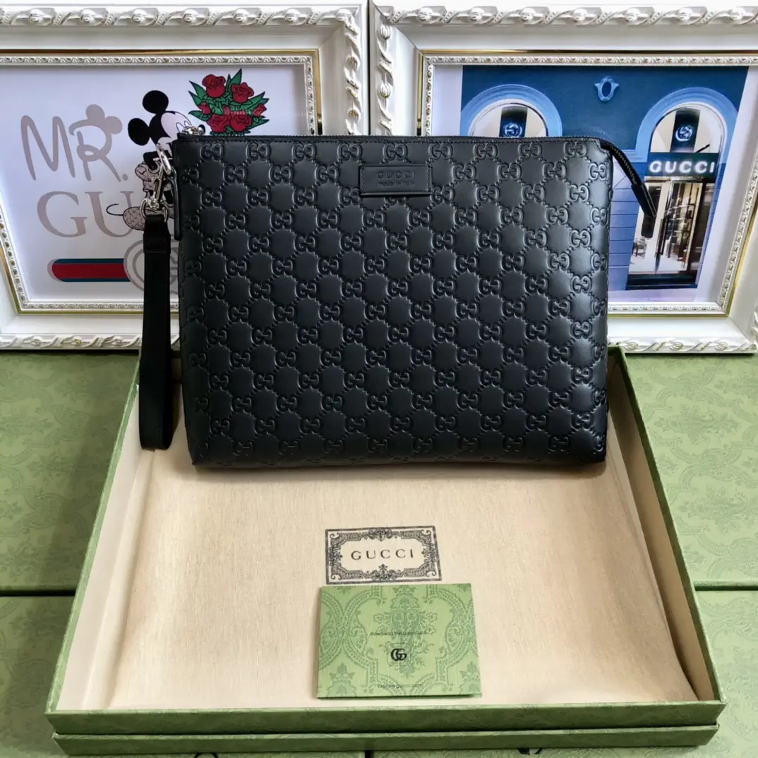 Gucci Black Embossed Monogram Clutch image 1