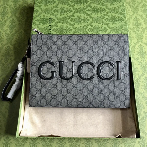 Gucci Monogram Clutch with Wrist Strap image 1