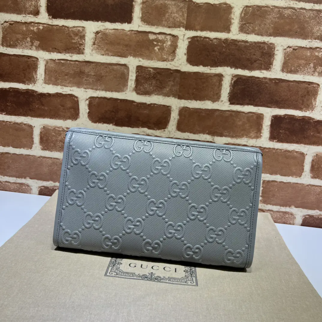 Gucci Gray GG Embossed Clutch image 1