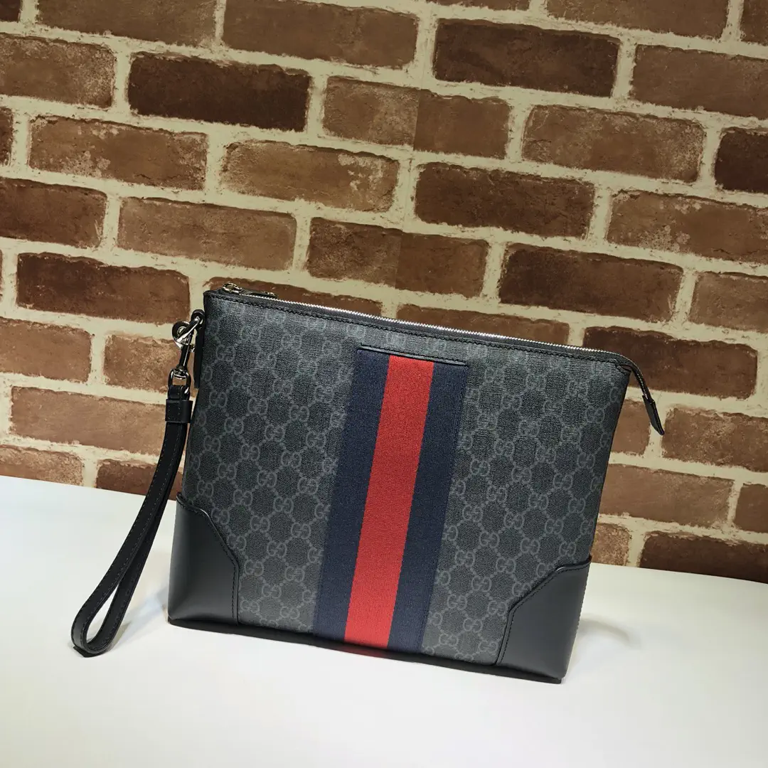 Gucci Monogram Clutch image 1