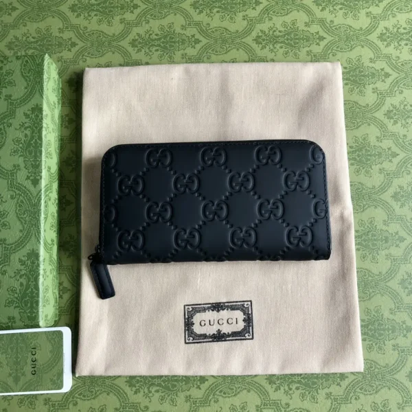 Gucci Black GG Embossed Full-Zip Wallet image 1