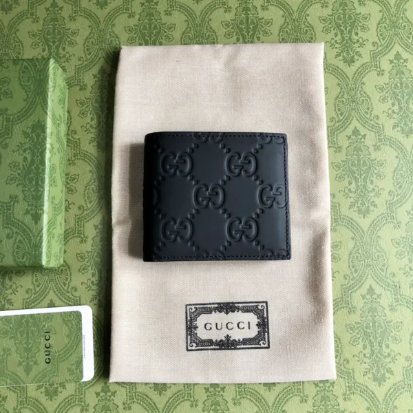 Gucci Black GG Embossed Bi-Fold Wallet image 1