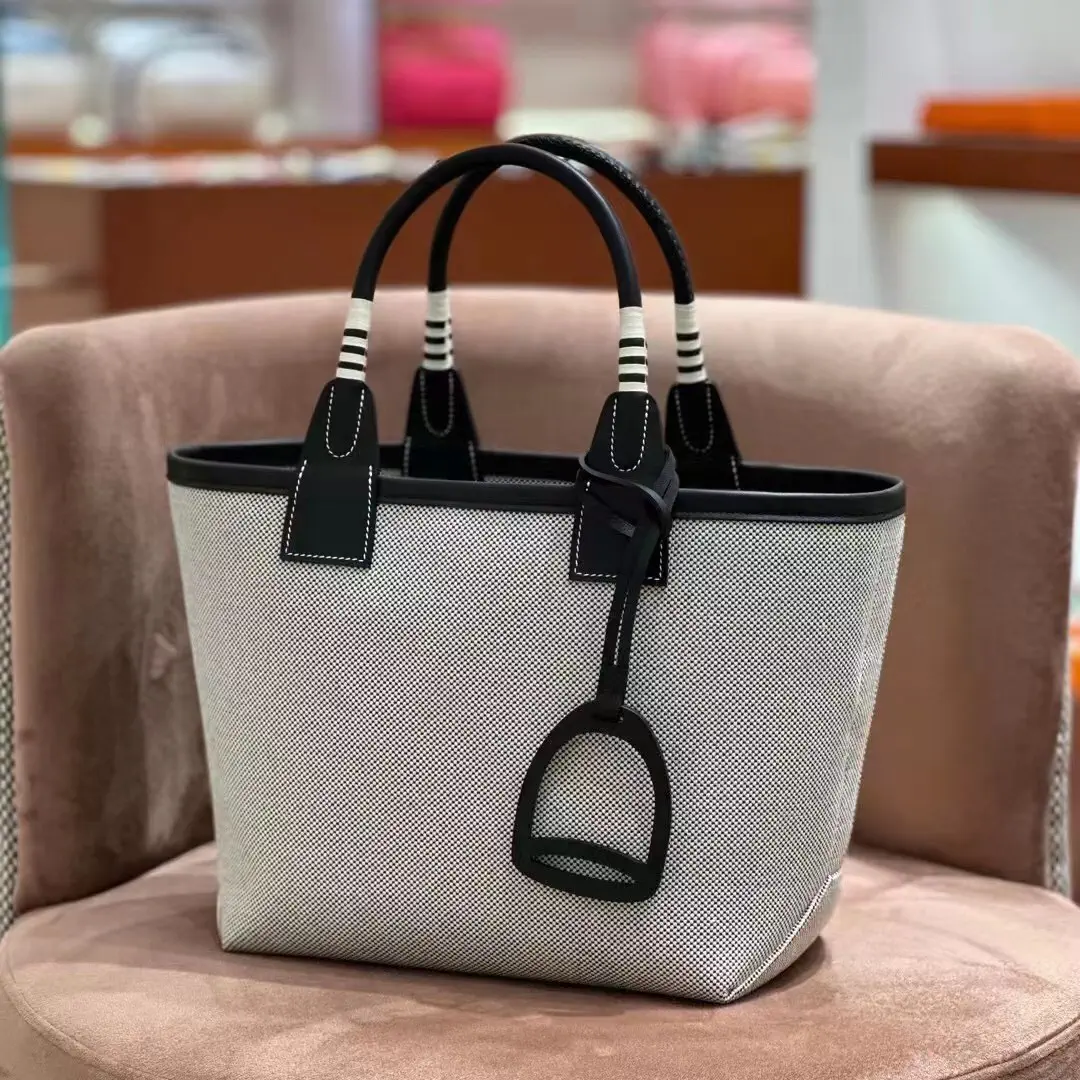 Hermès Canvas and Swift Calfskin Tote Bag image 1