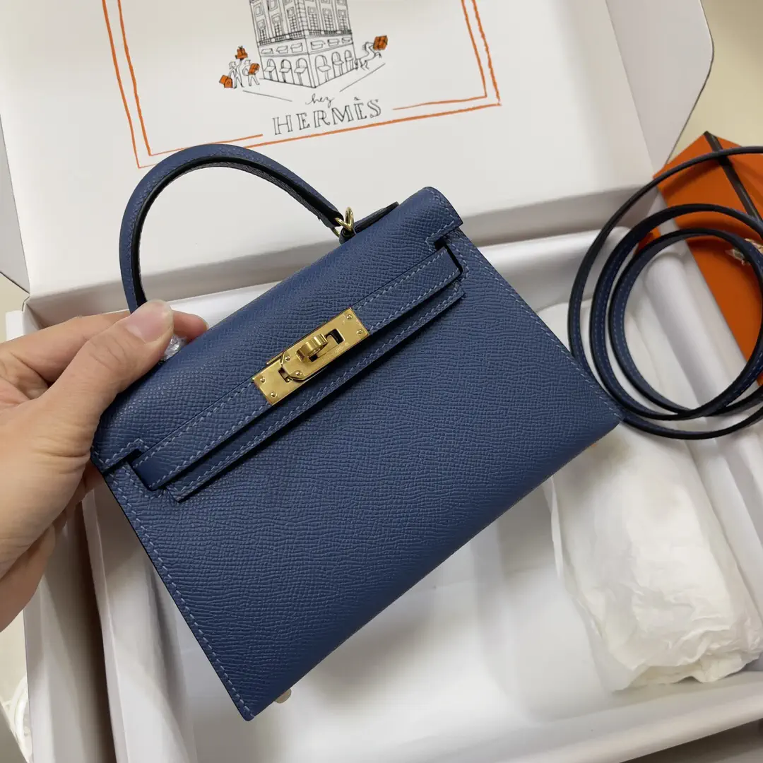 Hermès Blue Top Handle Bag with Gold Hardware image 1