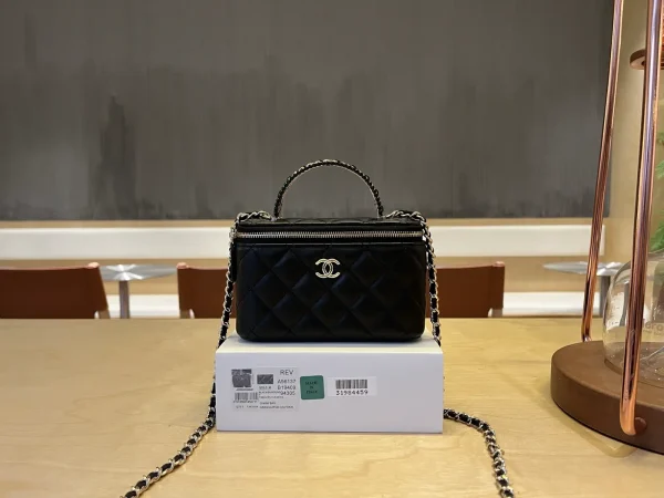 Chanel Quilted Cosmetic Bag with Woven Handle image 1