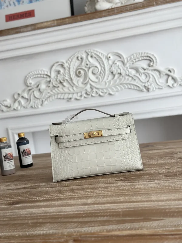 Hermès Crocodile-Embossed Kelly Mini Clutch image 1