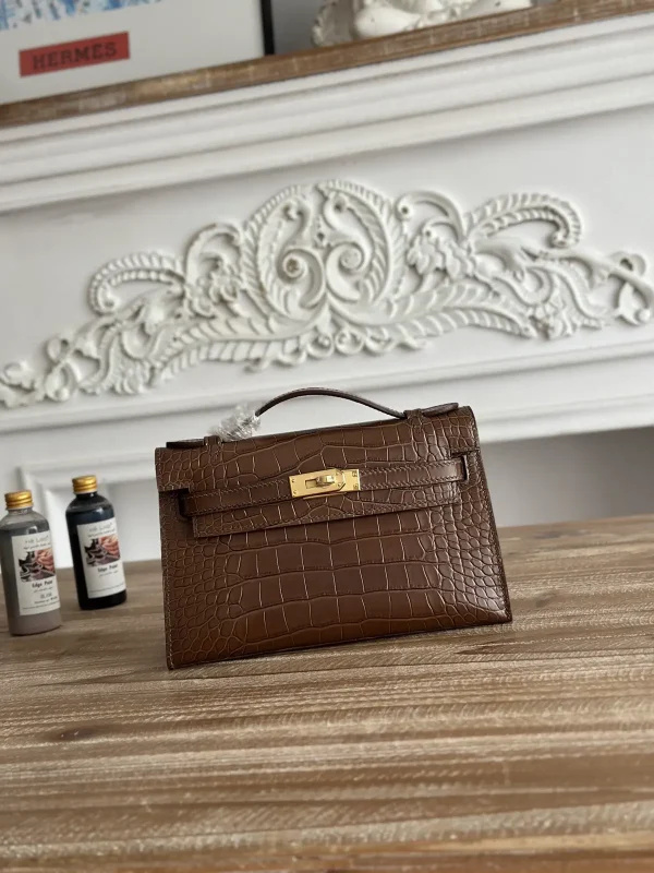 Hermès Crocodile-Embossed Mini Kelly Clutch image 1