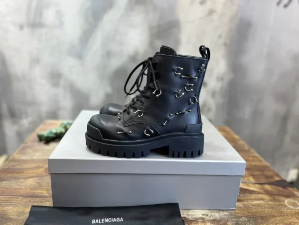 Balenciaga Lace-Up Martin Boots with Piercing Details image 1