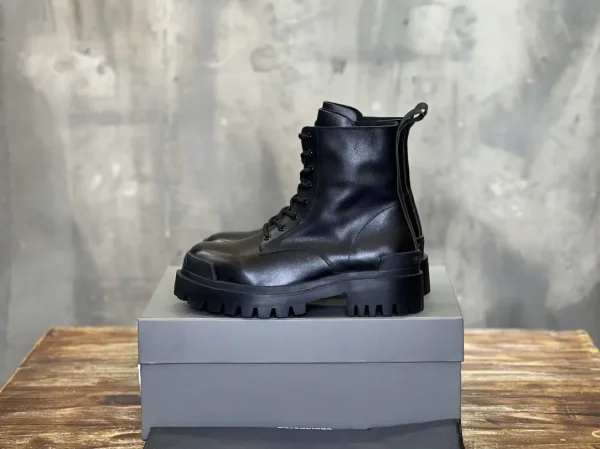 Balenciaga High-Top Distressed Leather Boots image 1