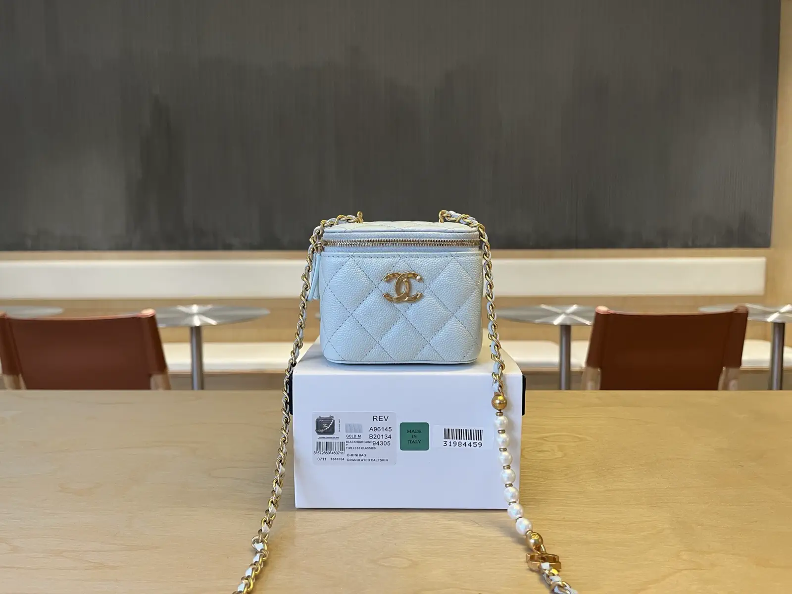 Chanel Quilted Pearl Chain Crossbody Bag image 1