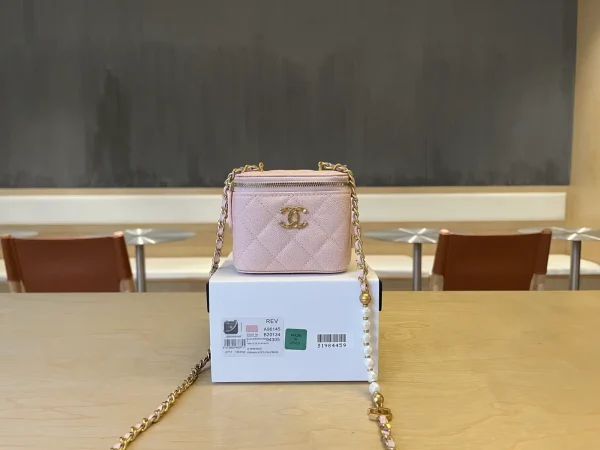 Chanel Quilted Pearl Chain Mini Vanity Bag image 1