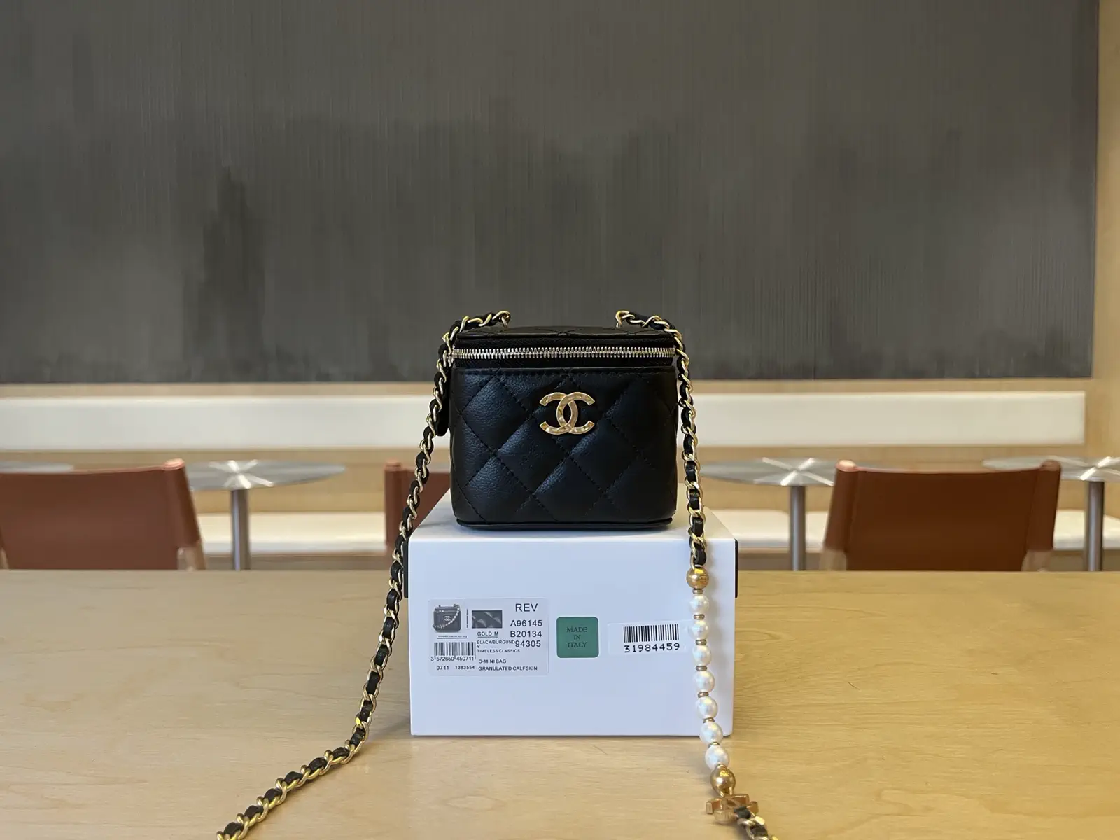 Chanel Quilted Pearl Chain Mini Crossbody Bag image 1