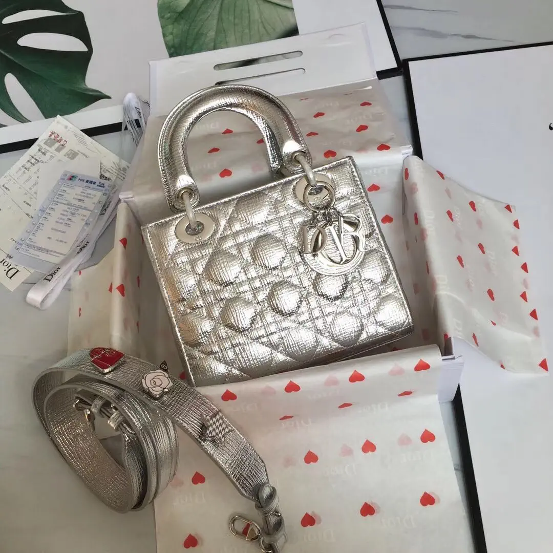 Dior Metallic Silver Quilted Top Handle Bag with Decorative Shoulder Strap image 1
