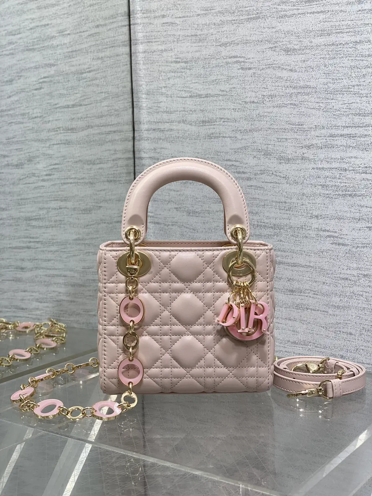 Dior Quilted Top Handle Bag with Charms image 1
