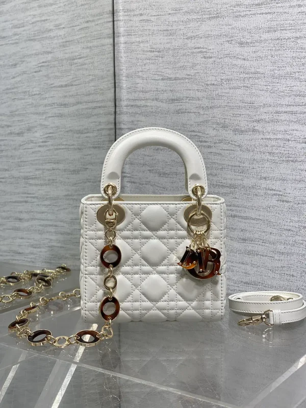 Dior White Quilted Top Handle Bag with Charms and Dual Straps image 1