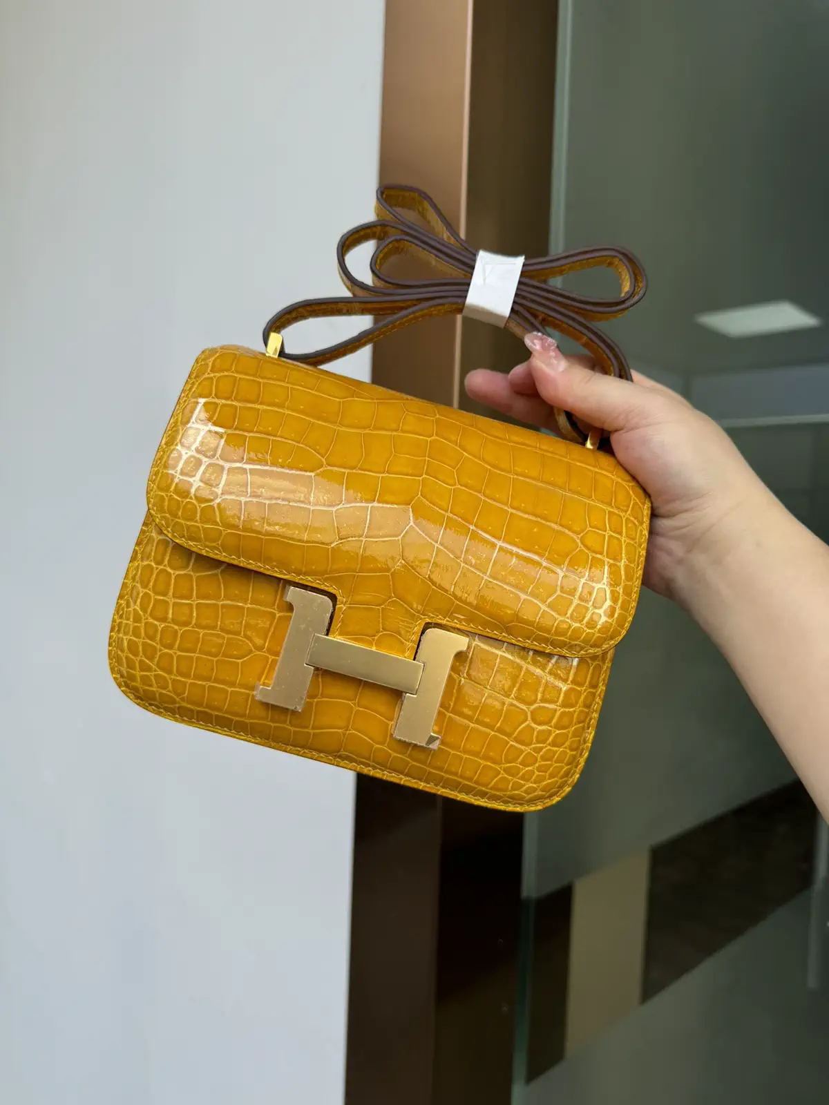 Hermès Amber Yellow Crocodile Constance Bag image 1