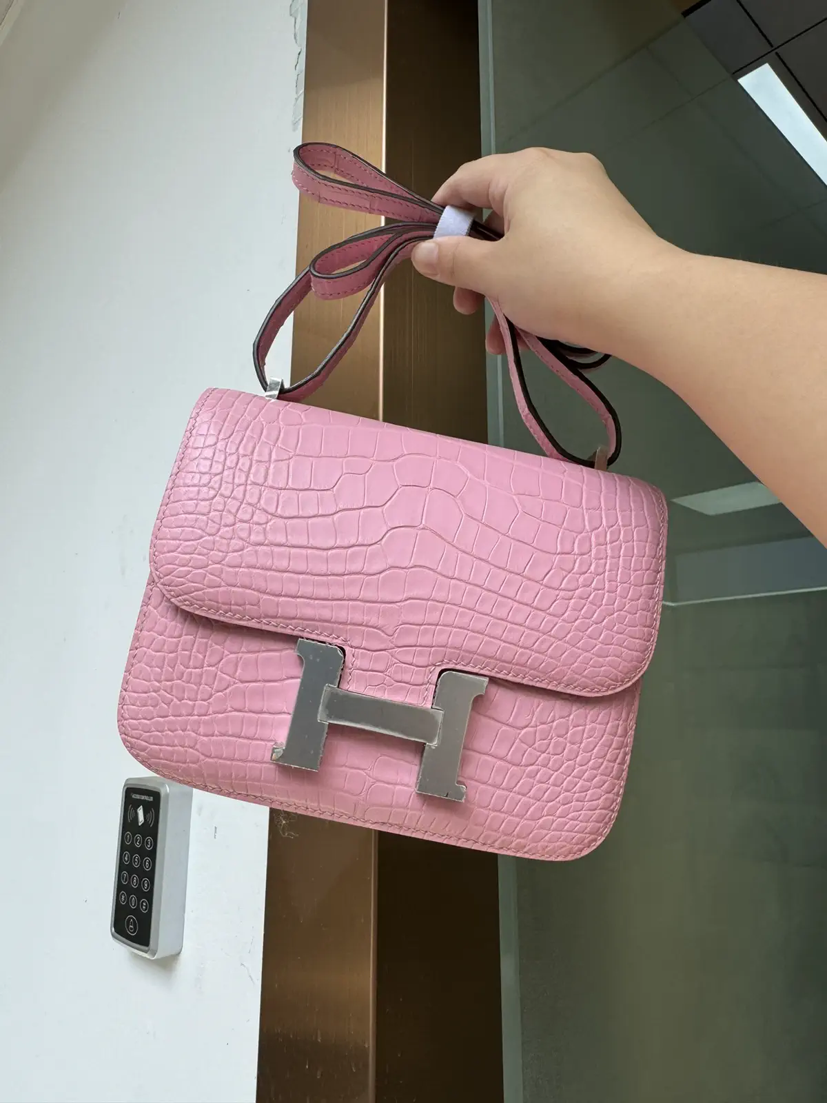 Hermès Pink Crocodile-Embossed Constance Bag image 1