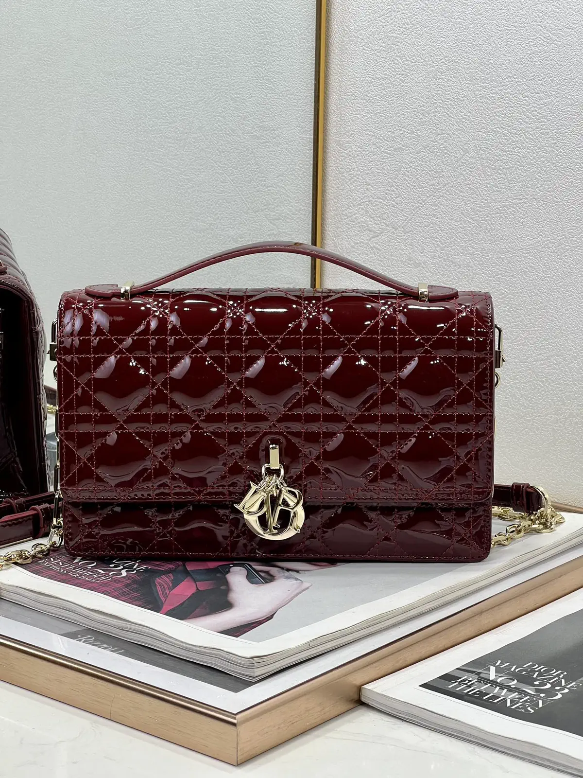 Dior Quilted Top Handle Bag with Charm image 1