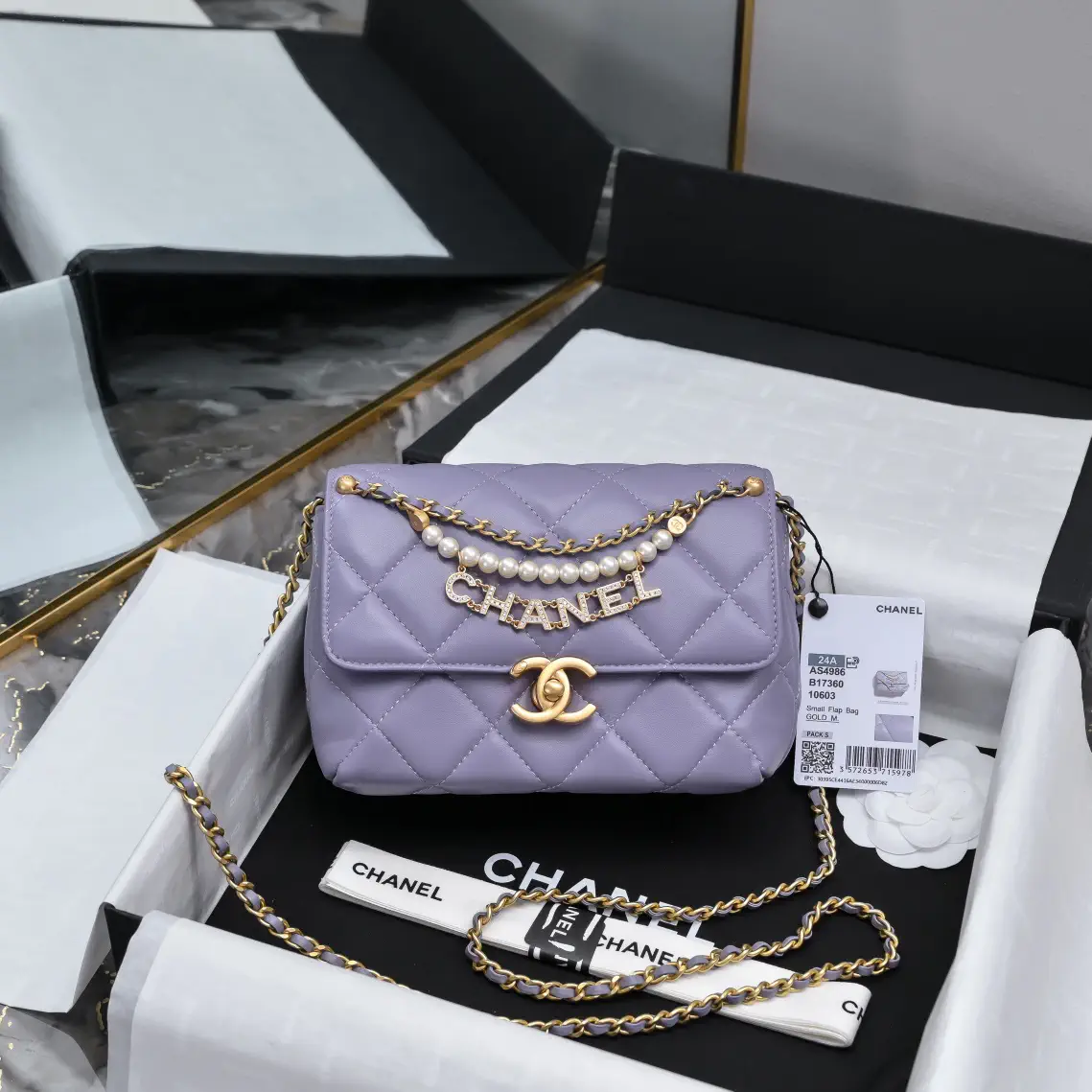 Chanel Quilted Flap Bag with Pearl Chain and Logo Charm image 1