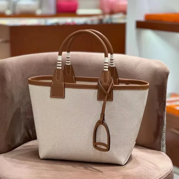 Hermès Canvas and Swift Calfskin Tote Bag image 1