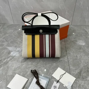 Hermès Striped Canvas and Leather Top Handle Bag image 1