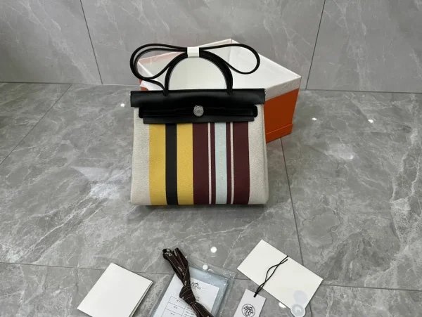 Hermès Striped Canvas and Leather Top Handle Bag image 1