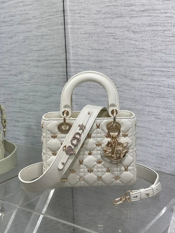 Dior Quilted Top Handle Bag with Decorative Studs image 1