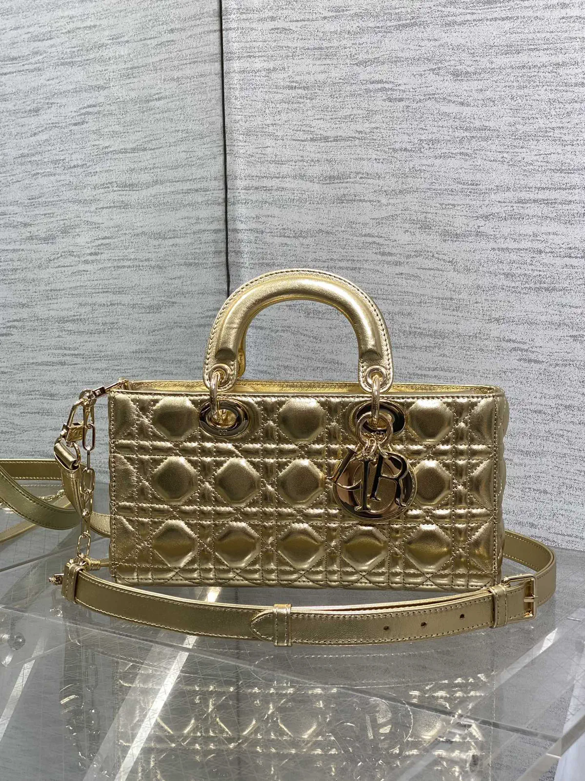 Dior Quilted Metallic Gold Top Handle Bag image 1