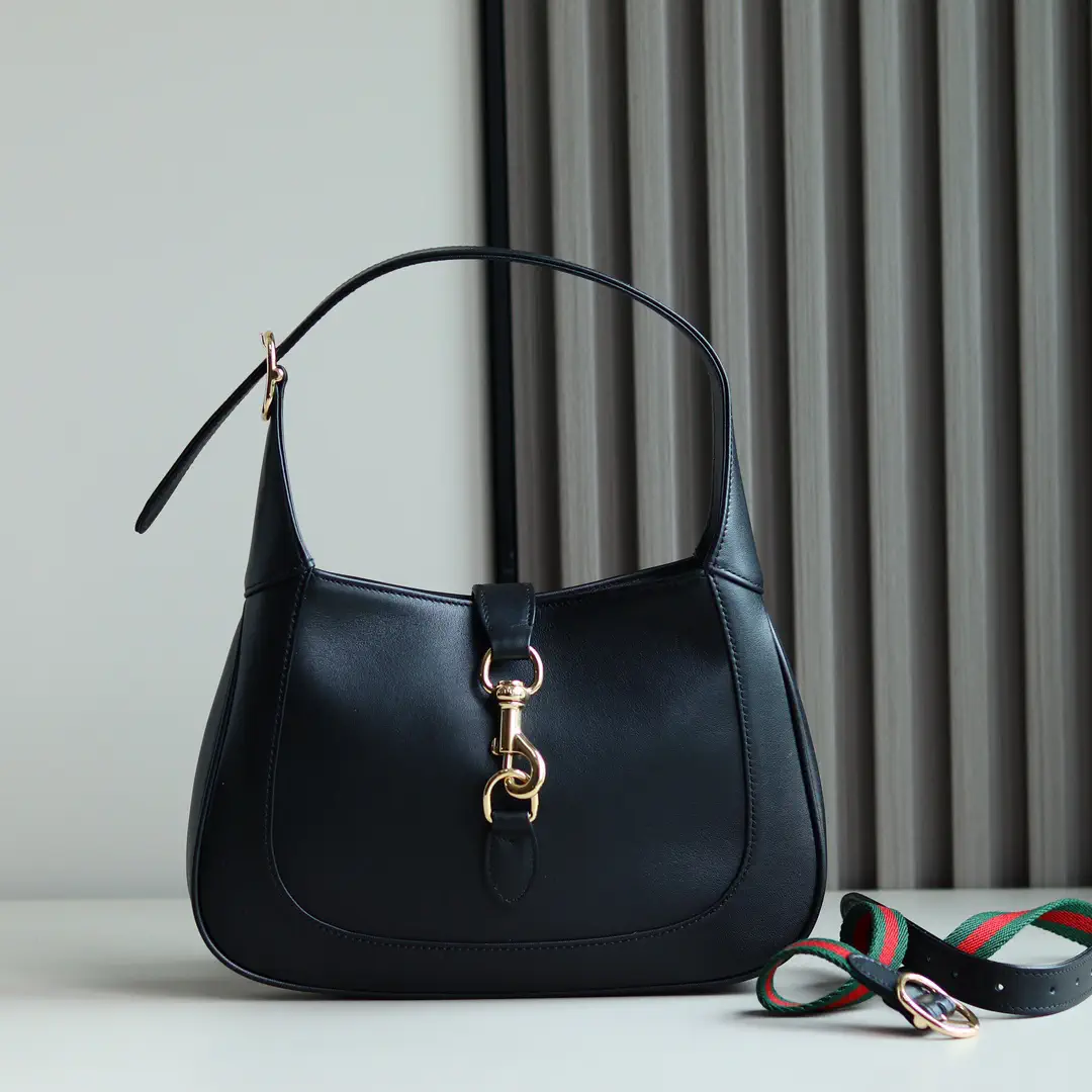 Gucci Black Leather Shoulder Bag with Gold Hardware image 1