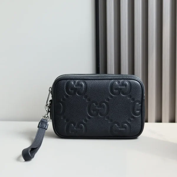 Gucci Monogram Clutch image 1