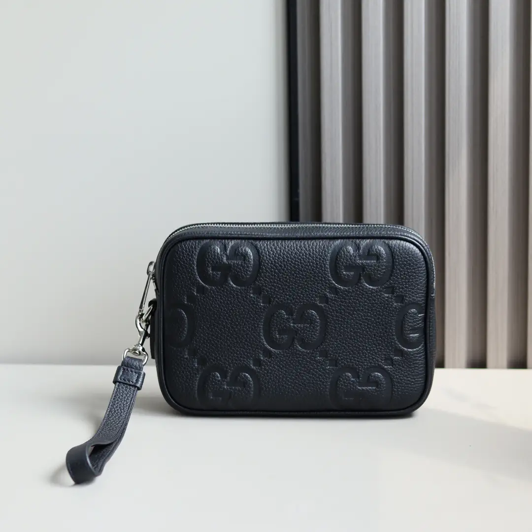 Gucci Monogram Clutch image 1