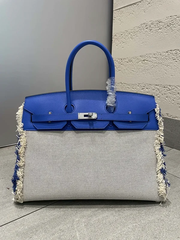 Hermès Fringed Canvas and Leather Top Handle Bag image 1