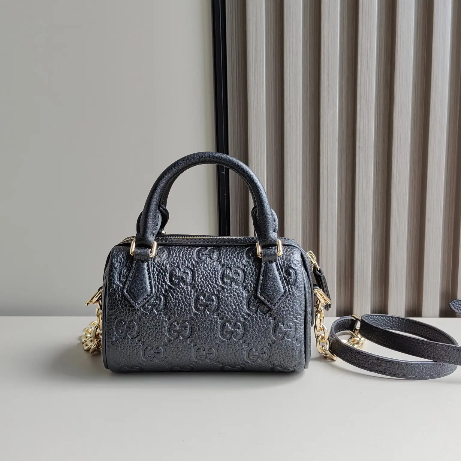 Gucci GG Emblem Super Mini Top Handle Bag image 1