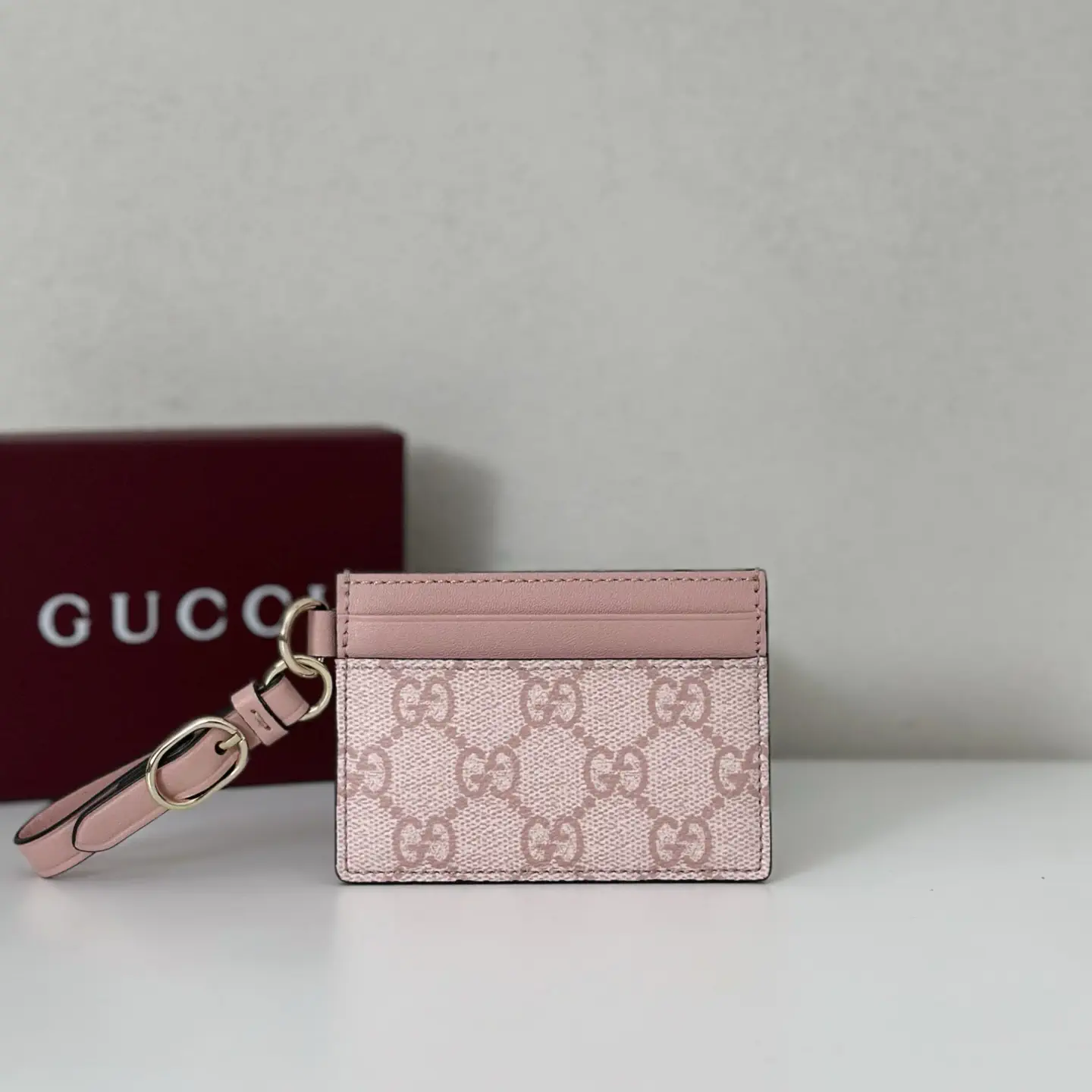 Gucci Monogram Card Holder with Wrist Strap image 1
