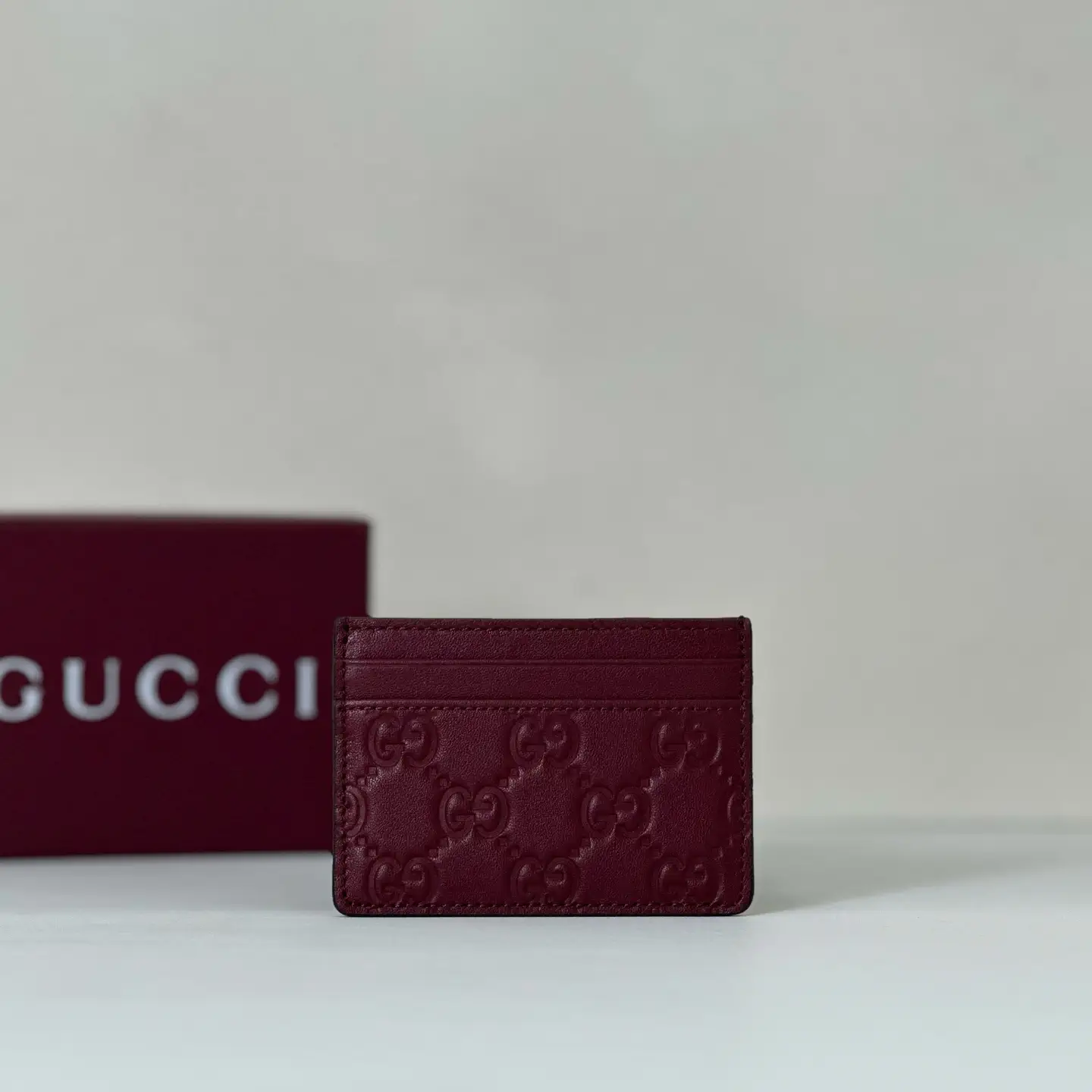 Gucci Burgundy Embossed Card Holder image 1