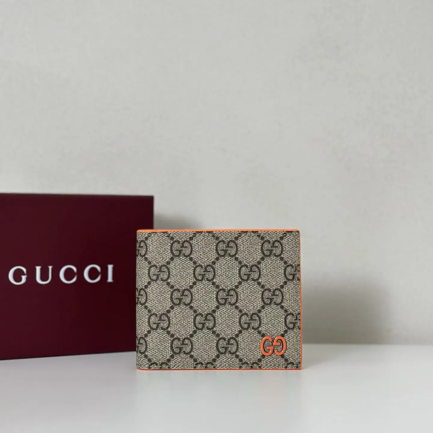 Gucci Monogram Bifold Wallet with Orange Accents image 1