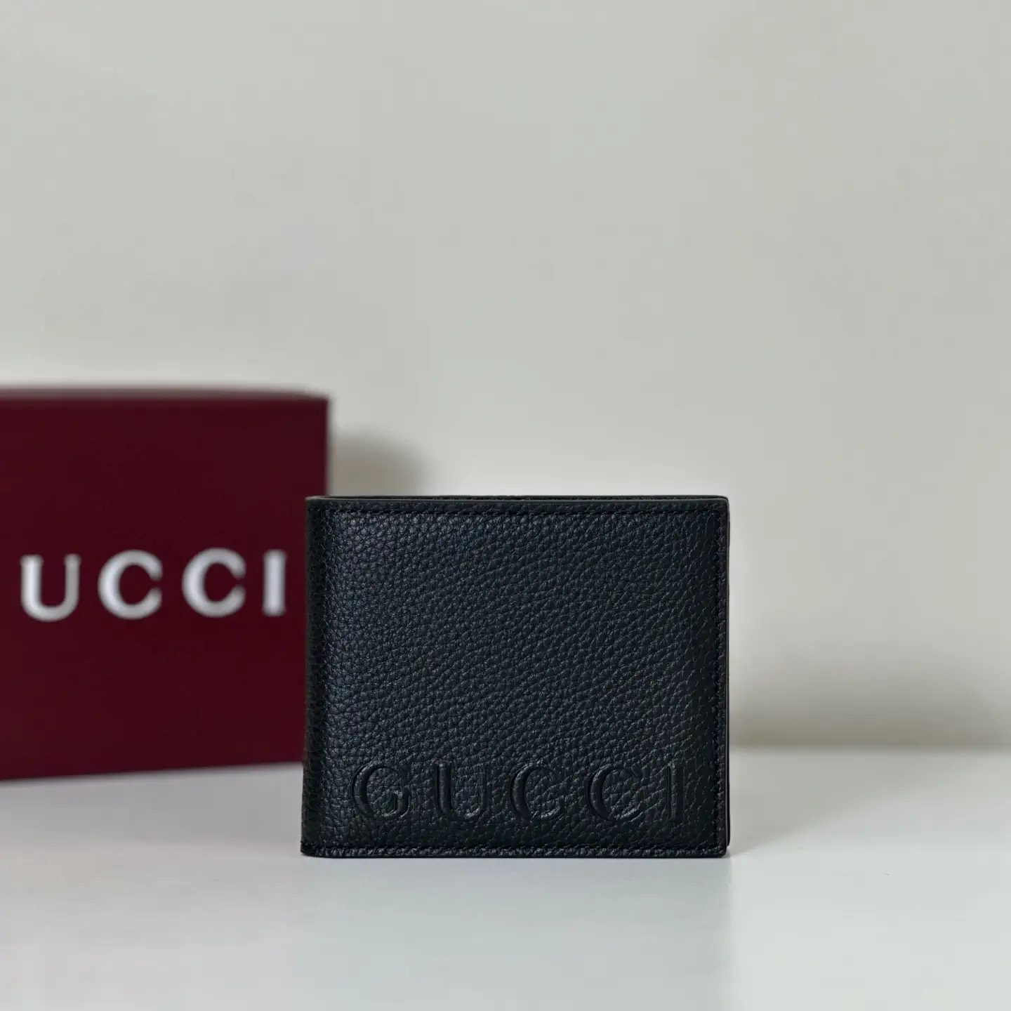 Gucci Embossed Logo Bifold Wallet image 1