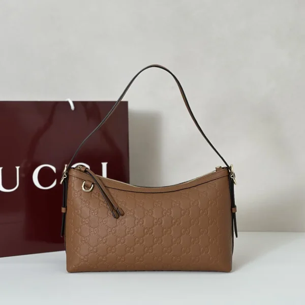 Gucci Brown Embossed Monogram Shoulder Bag image 1