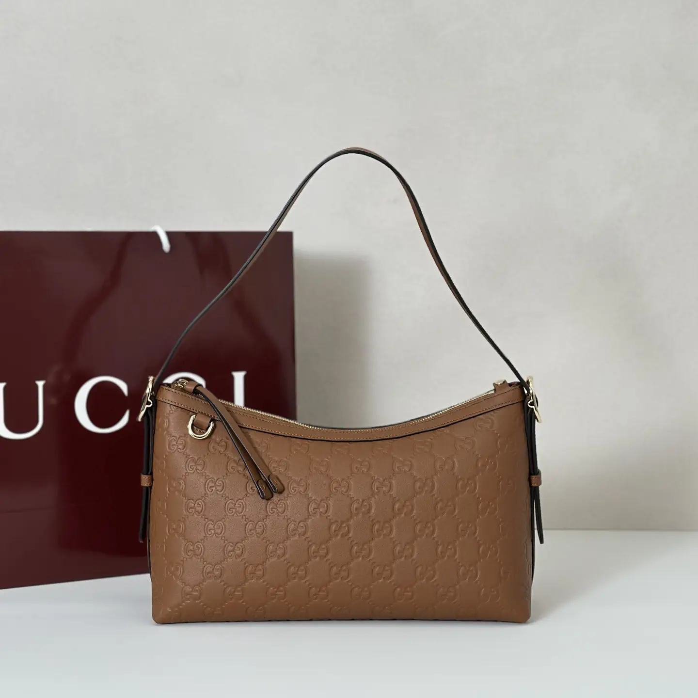 Gucci Brown Embossed Monogram Shoulder Bag image 1