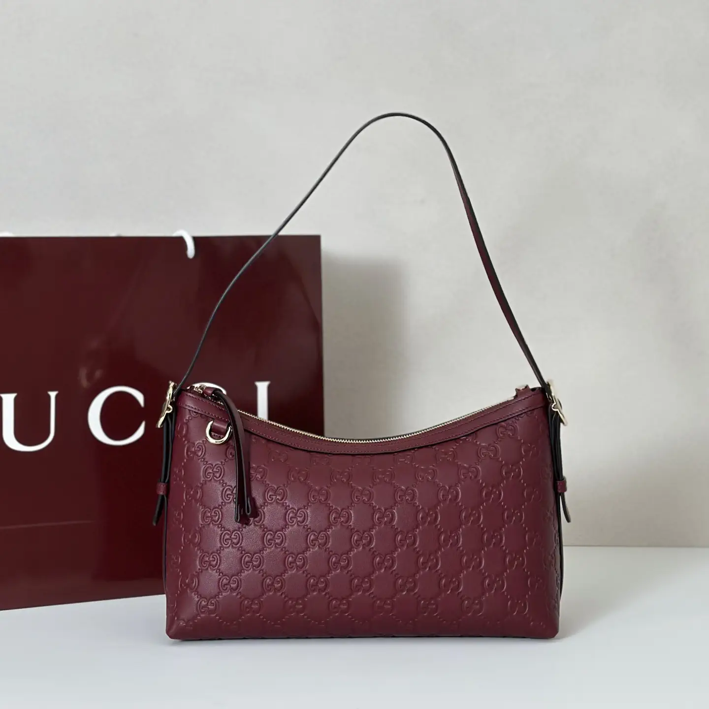 Gucci Embossed Monogram Shoulder Bag image 1
