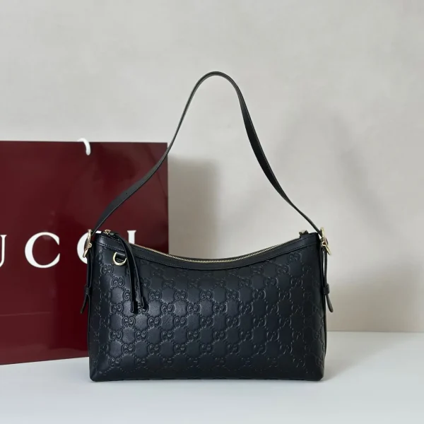 Gucci Embossed Monogram Shoulder Bag image 1