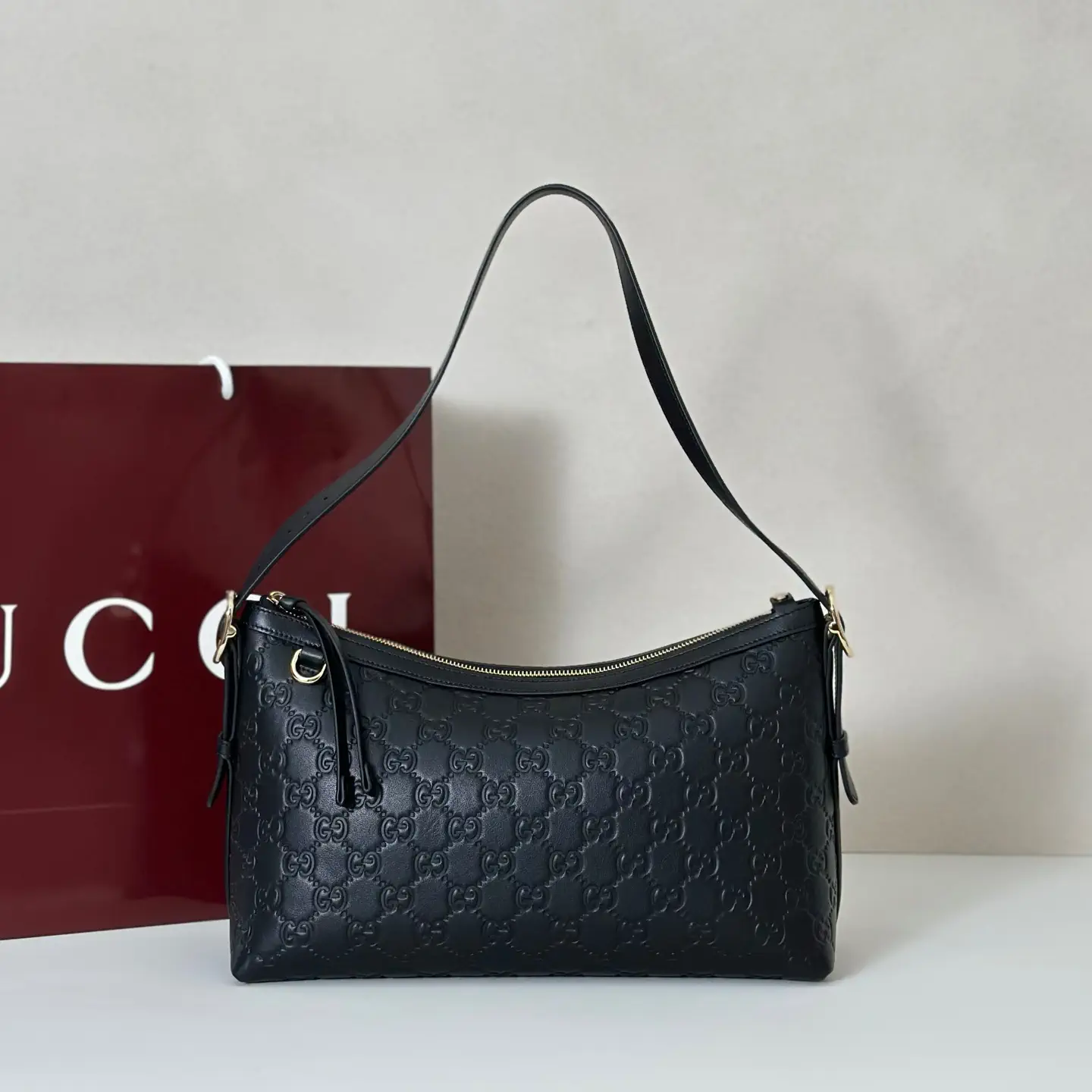 Gucci Embossed Monogram Shoulder Bag image 1